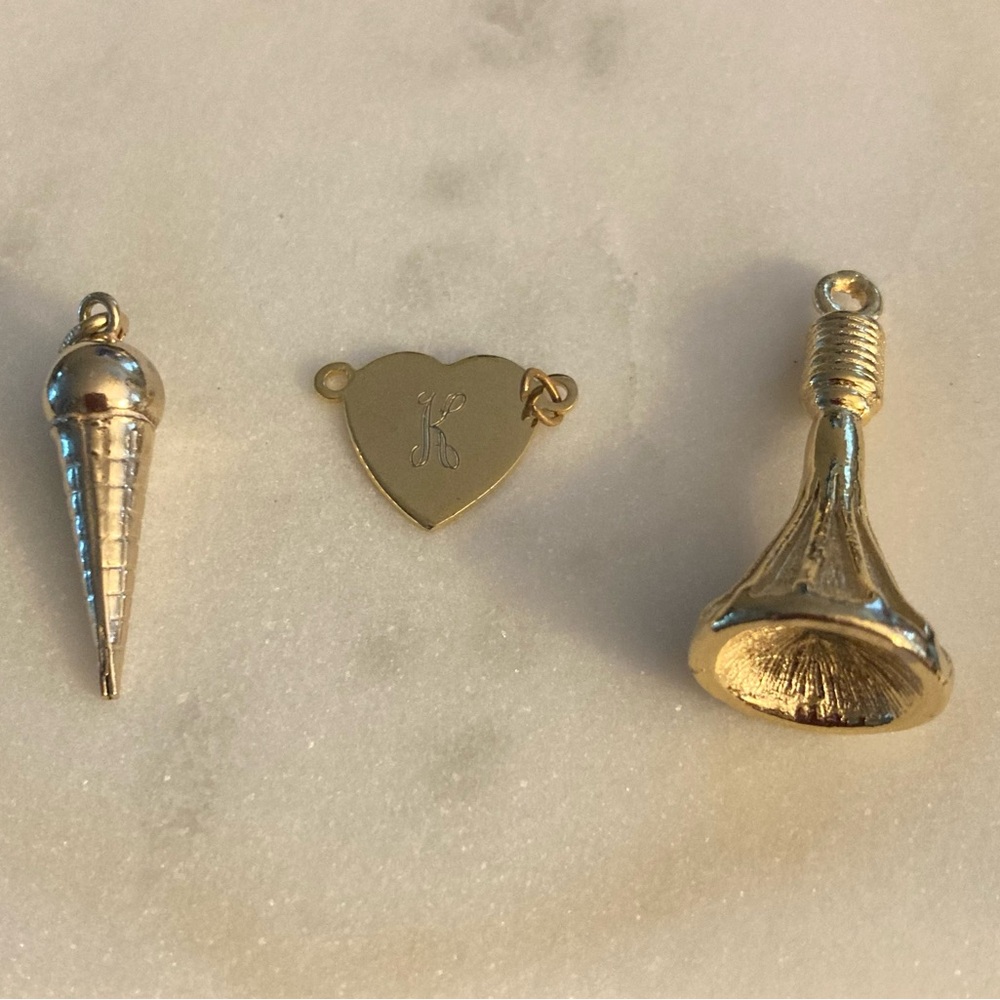 Set of three charms, gold tone, unisex, in bags
